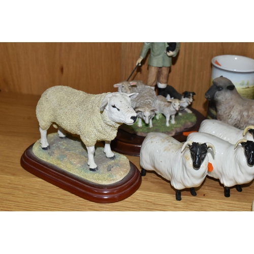 424 - A GROUP OF CERAMICS WITH A FARMING THEME, to include three x Beswick Black Faced Sheep no 1765, a Be... 