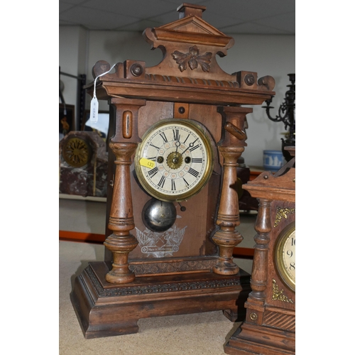 433 - THREE CLOCKS, comprising a large wooden mantel clock with pendulum and key, height 49cm, a smaller m... 