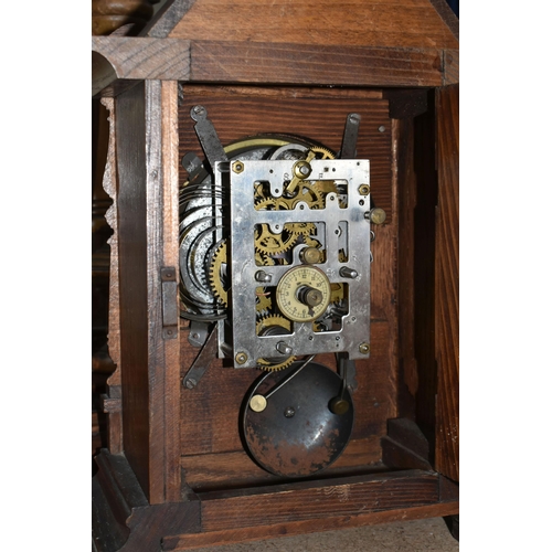 433 - THREE CLOCKS, comprising a large wooden mantel clock with pendulum and key, height 49cm, a smaller m... 