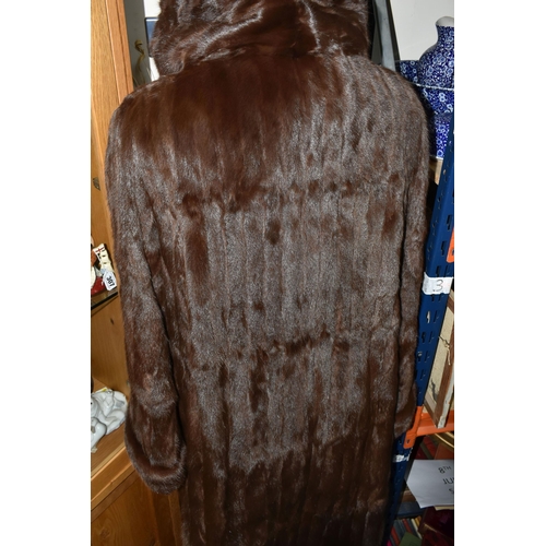 310 - A VINTAGE FUR COAT, chestnut coloured fur, mid - length coat with integral hood, approximate size 14... 