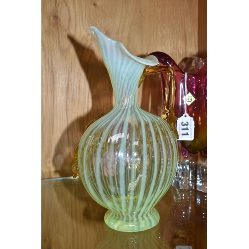 311 - A VICTORIAN VASELINE GLASS JUG, yellow swirled Uranium glass with applied pink and amber flowers, he... 