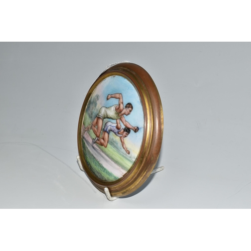 480 - AN EARLY 20TH CENTURY SPORTING ENAMEL PLAQUE DEPICTING TWO MALE ATHLETES IN A SPRINT, brass coated c... 