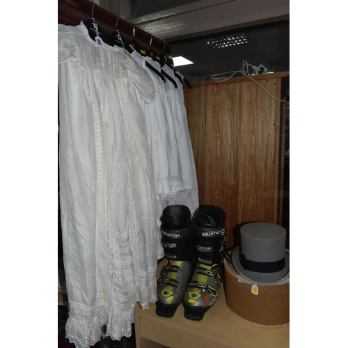 492 - A TOP HAT, SKI BOOTS AND BABIES' GOWNS, comprising a boxed grey top hat with black band, stamped to ... 