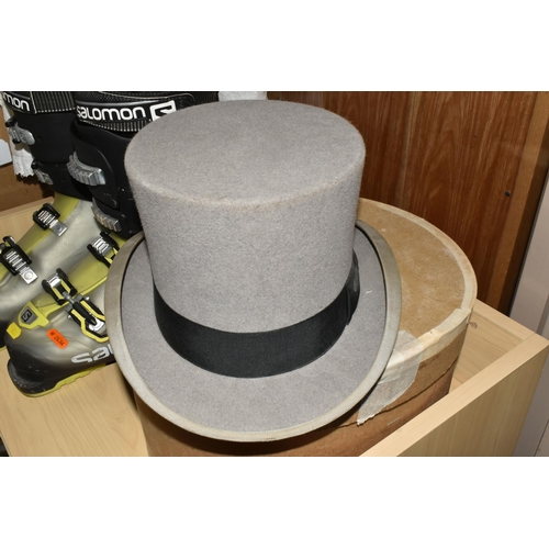 492 - A TOP HAT, SKI BOOTS AND BABIES' GOWNS, comprising a boxed grey top hat with black band, stamped to ... 