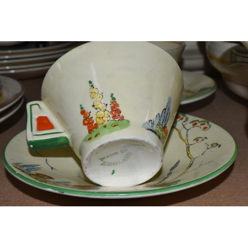 503 - A GROUPS OF ART DECO STYLE CERAMIC KITCHENWARE FROM NAMED MANUFACTURERS to include a twenty four pie... 