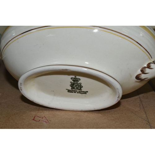 503 - A GROUPS OF ART DECO STYLE CERAMIC KITCHENWARE FROM NAMED MANUFACTURERS to include a twenty four pie... 