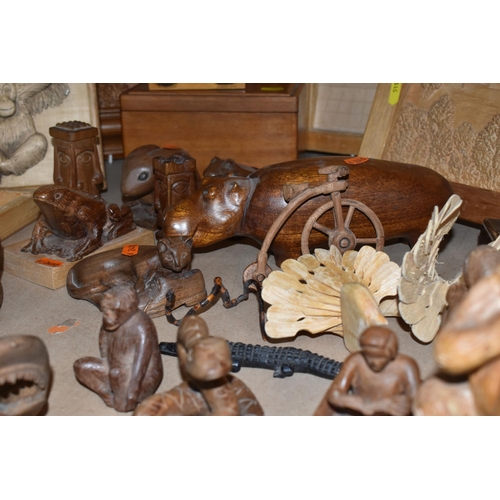 519 - A COLLECTION OF TREEN, comprising six carved wood wall plaques carved signature to the back 'SamL' (... 