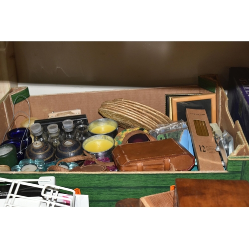 522 - SIX BOXES AND LOOSE MISCELLANEOUS SUNDRIES, to include a wooden book shelf, candles, tea lights, a b... 