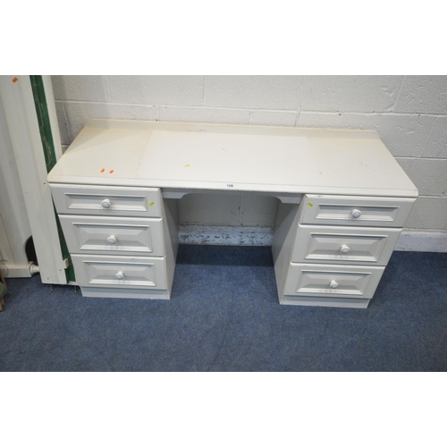 1191 - A WHITE PAINTED 5FT BEDSTEAD, with side rails, slats and bolts, along with a dressing table, a chest... 