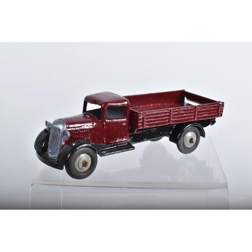 16 - A QUANTITY OF REPAINTED AND RESTORED DINKY TOYS VEHICLES, to include assorted 25 series lorries, wit... 