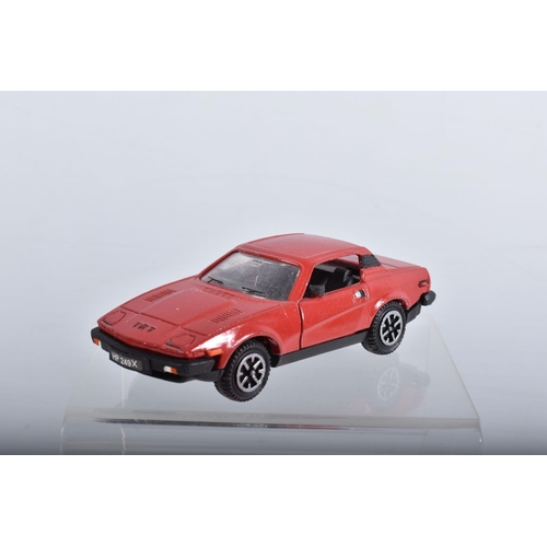 22 - FOUR BOXED TRIUMPH TR7 AND TR8 SPORTS CAR MODELS, all 1/43 white metal kits that have been construct... 