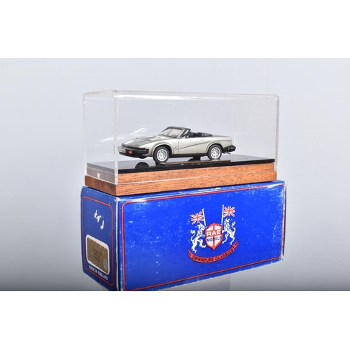 22 - FOUR BOXED TRIUMPH TR7 AND TR8 SPORTS CAR MODELS, all 1/43 white metal kits that have been construct... 