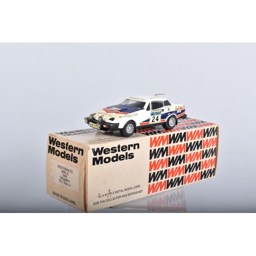 22 - FOUR BOXED TRIUMPH TR7 AND TR8 SPORTS CAR MODELS, all 1/43 white metal kits that have been construct... 