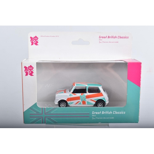 30 - ELEVEN BOXED MODEL DIE-CAST VEHICLES, to include a Corgi Mini in Mulberry Red CC82206, a Vanguards L... 