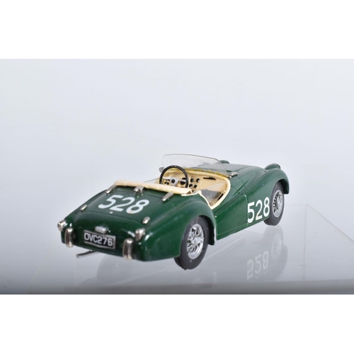 56 - FOUR CONSTRUCTED K & R REPLICAS TRIUMPH TR2 SPORTS CAR MODEL KITS, all 1/43 white metal kits that ha... 