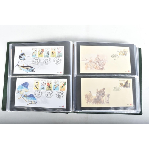 408 - BANANA BOX WITH COLLECTION OF WORLDWIDE FDCS IN ALBUMS, OFTEN ANIMAL THEMATICS, ALSO SOME FRAMED ITE... 