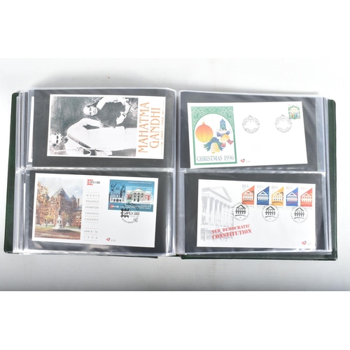 408 - BANANA BOX WITH COLLECTION OF WORLDWIDE FDCS IN ALBUMS, OFTEN ANIMAL THEMATICS, ALSO SOME FRAMED ITE... 