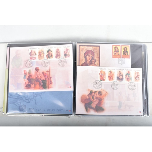 408 - BANANA BOX WITH COLLECTION OF WORLDWIDE FDCS IN ALBUMS, OFTEN ANIMAL THEMATICS, ALSO SOME FRAMED ITE... 