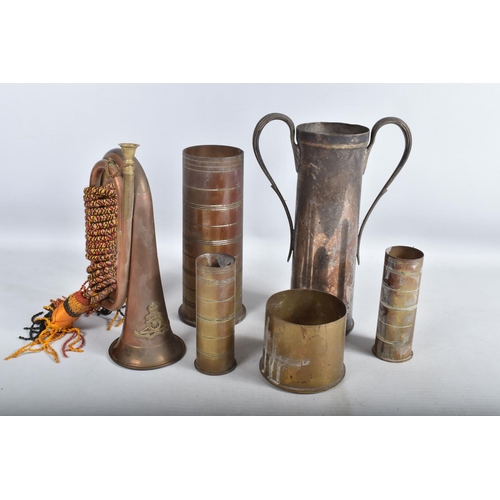 413 - A COLLECTION OF WWI AND WWII BRASS TRENCH ART SHELLS AND BRASS BUGLE, the shells include a pair of 1... 