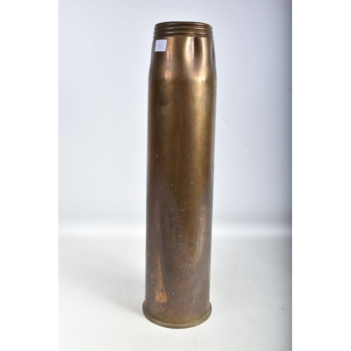 416 - A LARGE BRASS ARTILERY SHELL DATED 1965, the bottom of it has the war department broad arrow and 4.5... 