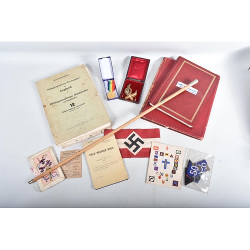 439 - A MIXED COLLECTION OF ASSORTED BRITISH AND GERMAN MILITARIA , this lot includes a swagger stick with... 