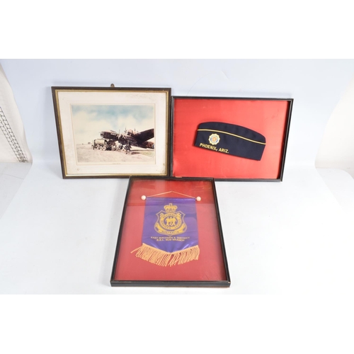 445 - MILITARY AND AIRFORCE INTEREST, a group of framed prints, plaques, pennants, plate, etc. (17) to inc... 