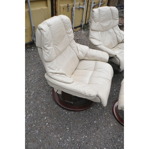 1310 - A PAIR OF EKORNESS STRESSLESS SWIVEL RECLINING ARMCHAIRS, width 87cm x depth 90cm x height 94cm, alo... 