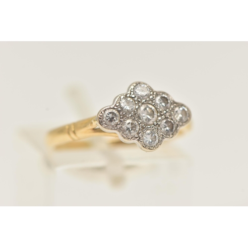 27 - A YELLOW METAL DIAMOND RING, of a marquise shape set with nine round brilliant cut diamonds, estimat... 