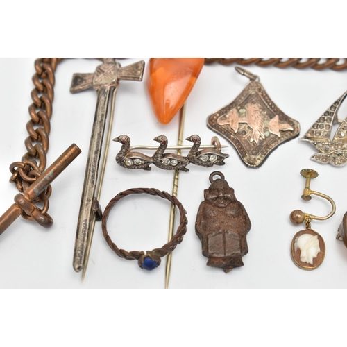 56 - A SELECTION OF JEWELLERY, to include a heart shape amber stickpin, a marcasite boat brooch, a cluste... 