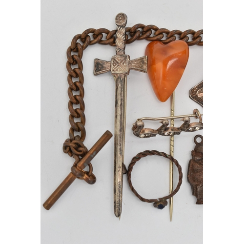 56 - A SELECTION OF JEWELLERY, to include a heart shape amber stickpin, a marcasite boat brooch, a cluste... 