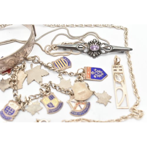 65 - A SELECTION OF SILVER AND WHITE METAL JEWELLERY, to include a silver hinged bangle, a charm bracelet... 