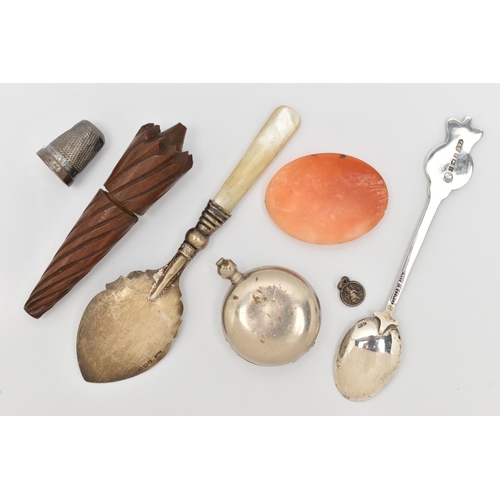 71 - A SMALL BAG OF ITEMS, to include a silver commemorative teaspoon for Queen Elizabeth II, hallmarked ... 