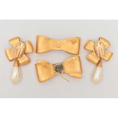 82 - A PAIR OF 'ELIZABETH ARDEN' EARRINGS AND A BROOCH, designed as bows with imitation pearl droppers, t... 