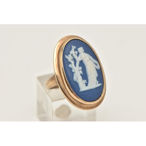 91 - A 9CT GOLD WEDGWOOD RING, large blue and white Wedgwood inlay, singed to the reverse, in a milgrain ... 