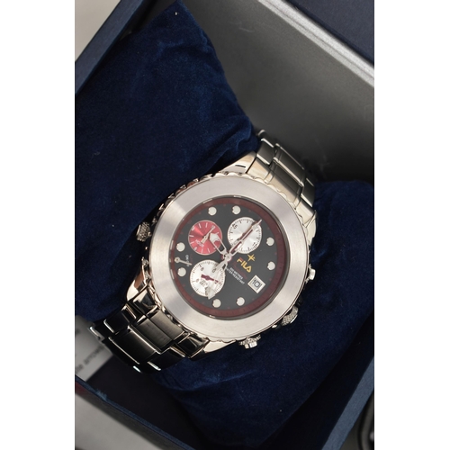 109 - SEVEN BOXED WRISTWATCHES, to include three Fila chronograph watches, two with titanium cases, one st... 