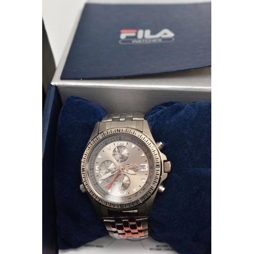 109 - SEVEN BOXED WRISTWATCHES, to include three Fila chronograph watches, two with titanium cases, one st... 