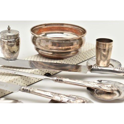 131 - A BOX OF SILVER ITEMS, to include a pair of pepperettes, polished urn form with Celtic pattern colla... 