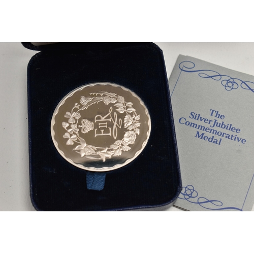 153 - A QUANTITY OF SILVER COINS AND MEDALS, to include a cased Westminster 1996 St Helena sterling silver... 