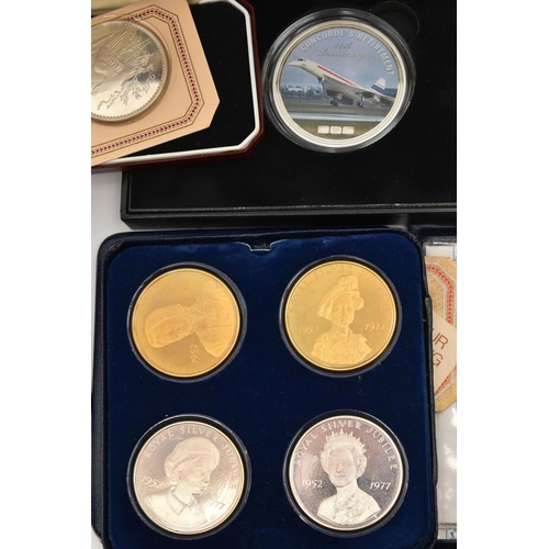 155 - A CARDBOARD BOX CONTAINING CONCORDE MEMMORABILIA AND OTHER COINS, to include a 2oz, 2013 Concorde Re... 