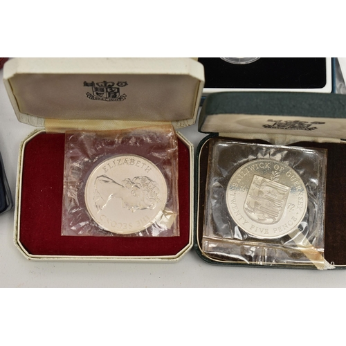 156 - A CARDBOARD BOX OF SILVER, SILVER PROOF AND OTHER COINS, to include x7 silver cased Crown size coins... 