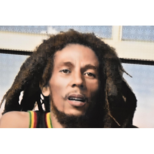 315 - NICK HOLDSWORTH (BRITISH CONTEMPORARY) 'BOB MARLEY', a portrait of the reggae star comprised of pixe... 