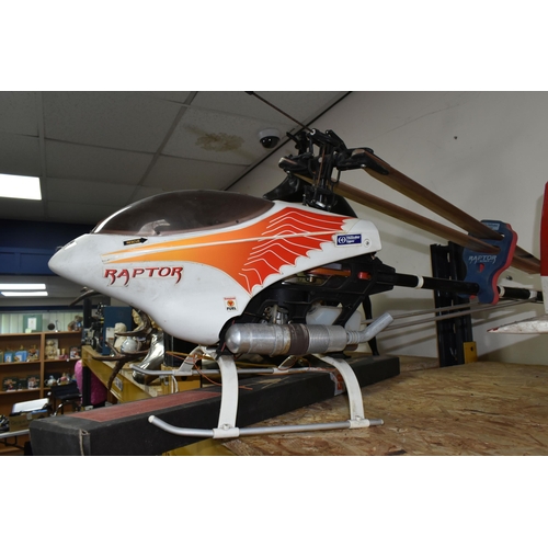 319 - A REMOTE CONTROL THUNDER TIGER RAPTOR HELICOPTER to include the Raptor 30 Class Helicopter and  an u... 