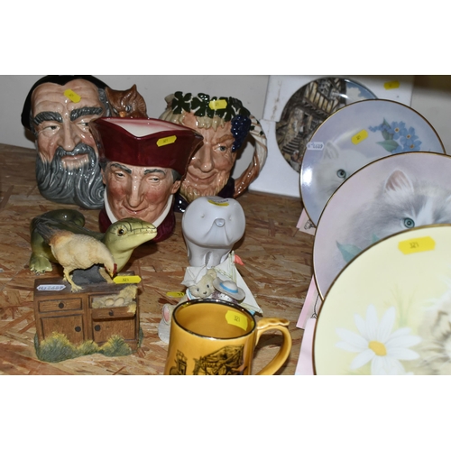 321 - SIXTEEN CERAMIC AND GLASS ITEMS, comprising three Royal Doulton character jugs, Merlin D6529, Bacchu... 