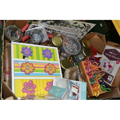 324 - FOUR BOXES OF ASSORTED ARTS AND CRAFTS SUPPLIES to include a rack of patterned scissors, a tub of be... 