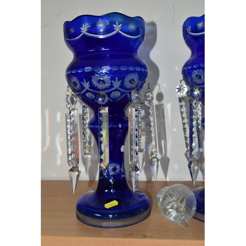 345 - A PAIR OF LUSTRES, blue cut to clear, each with eight hanging glass drops, height 36cm (2 + pot of l... 