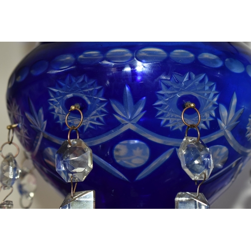 345 - A PAIR OF LUSTRES, blue cut to clear, each with eight hanging glass drops, height 36cm (2 + pot of l... 