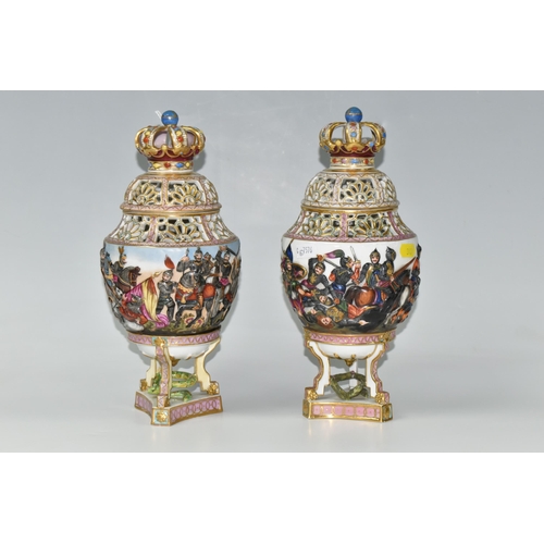 347 - A NEAR PAIR OF LATE NINETEENTH CENTURY CAPODIMONTE POT POURRI VASES, the finials in the form of a cr... 