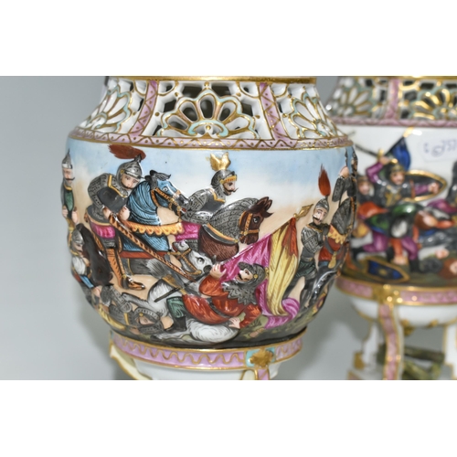 347 - A NEAR PAIR OF LATE NINETEENTH CENTURY CAPODIMONTE POT POURRI VASES, the finials in the form of a cr... 