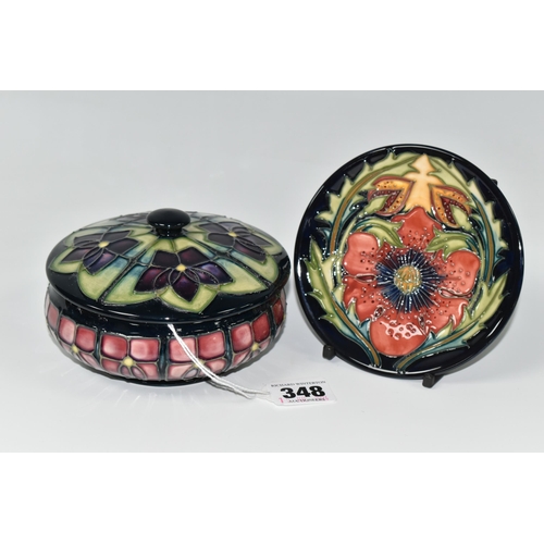 348 - TWO PIECES OF MOORCROFT POTTERY, comprising a Violet pattern covered bowl, tube lined with stylised ... 