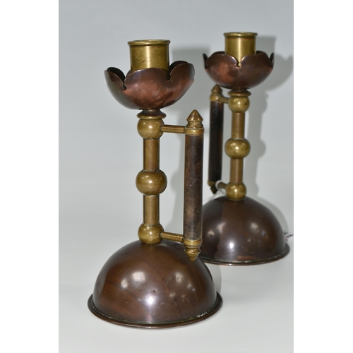 351 - A PAIR OF LATE NINETEENTH CENTURY CANDLESTICKS AFTER A DESIGN BY CHRISTOPHER DRESSER, for Benham & F... 